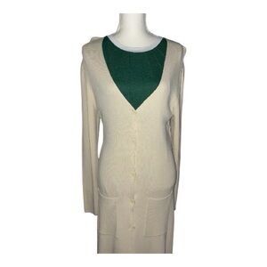 Woman’s Max Studio long sleeves cardigan buttons in front in a cream color